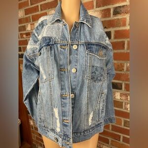 Light Blue Washed Denim Jacket with Subtle Patchwork